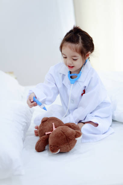 istock Little girl doctor 677521186