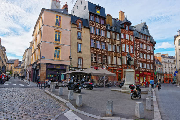 Old houses at Champ Jacquet square in Rennes in France Rennes, France - May 7, 2012: Old houses at Champ Jacquet square in the city center of Rennes, Brittany region, France. People on the background. rennes france photos stock pictures, royalty-free photos & images