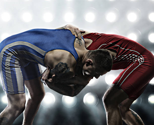 MMA fighters in lights background
