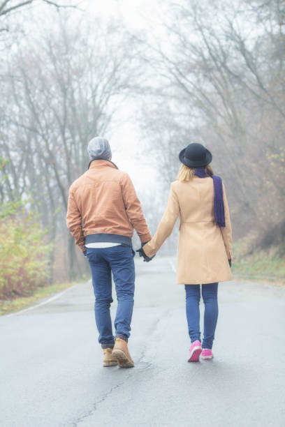 istock Young couple walking outdoors. 677650270