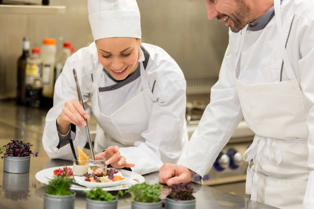 Cooking class Chef teaching to cook Culinary Schools stock pictures, royalty-free photos & images