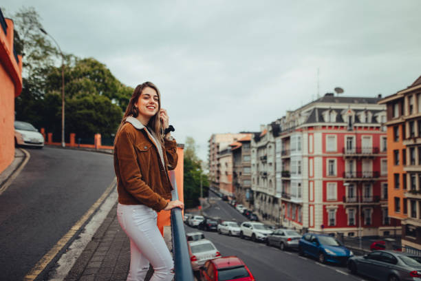 istock Young happy woman in urban environment 677701836