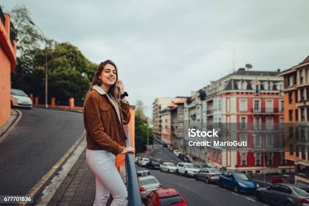 Young Happy Woman In Urban Environment Stock Photo - Download Image Now - 20-24 Years, 20-29 Years, Adult