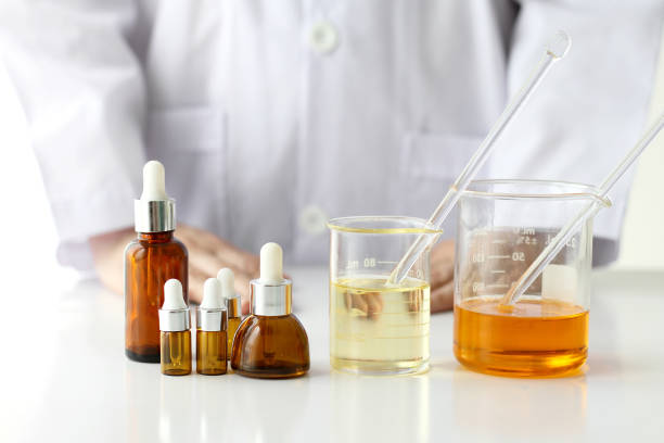 Beauty product concept, Doctor and medicine experiments, Pharmacist formulating the chemical for cosmetic stock photo