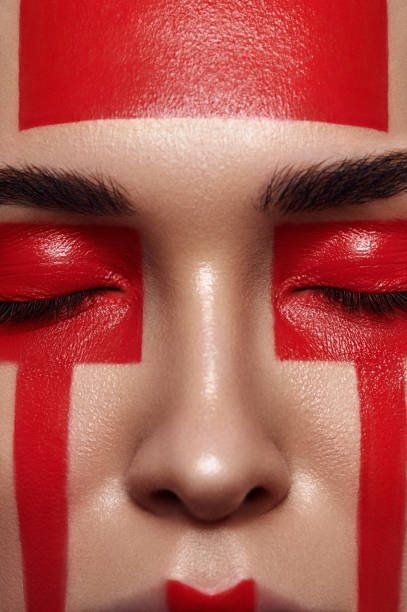 istock Beauty Woman with red Forms on Face 677723548
