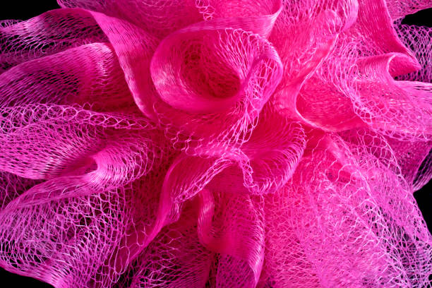 istock Close Up of Pink Sponge Puff Shower Scrub 677726146