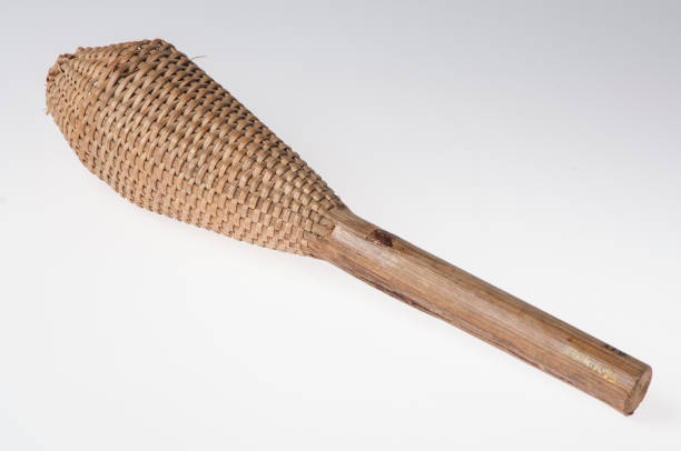 istock African handmade instrument, rattle isolated on white background 677739830