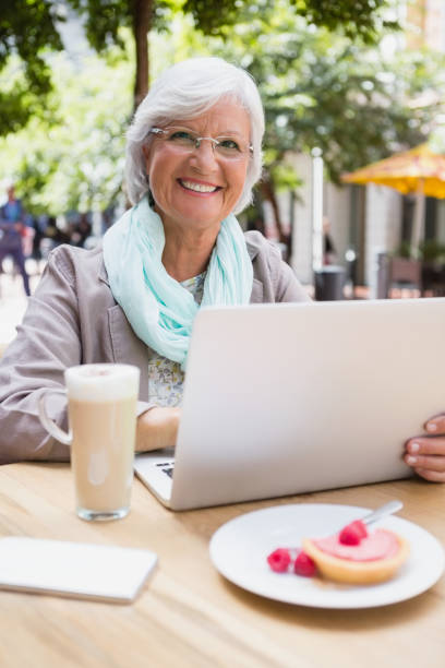 istock Senior woman using laptop 677763490