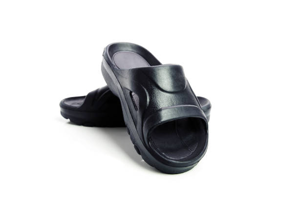 istock black slippers for men isolated on white background 677764306