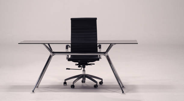 istock Table with top glass and leather armchair 677777784
