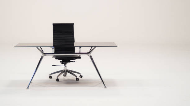 istock Table with top glass and leather armchair 677777786