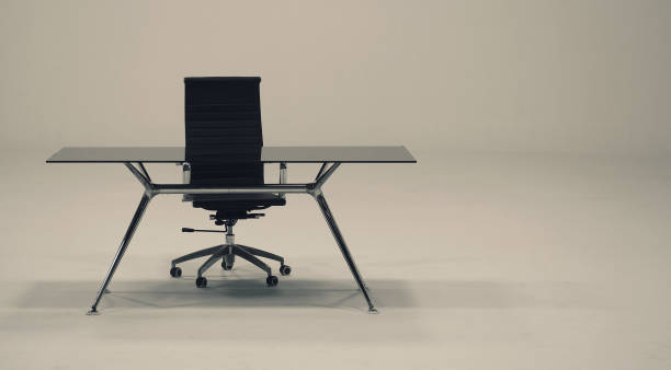 istock Table with top glass and leather armchair 677777790