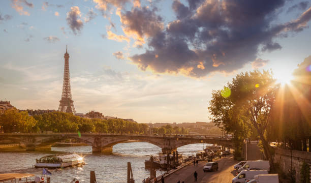istock Paris with Eiffel Tower against colorful sunset in France 677787488