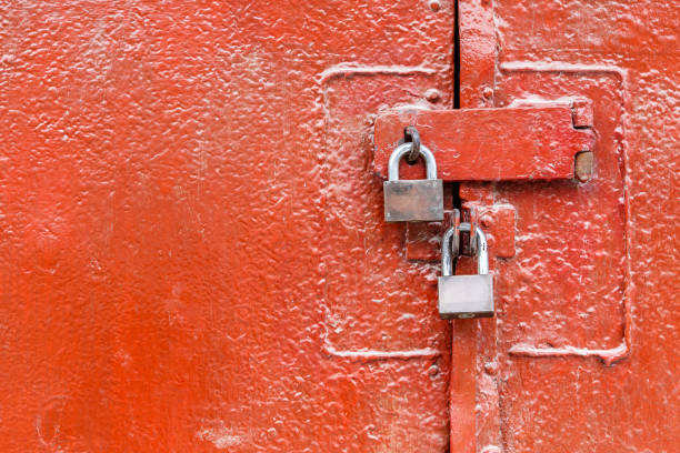 istock The padlock locking the old red metal rusty door 677810866