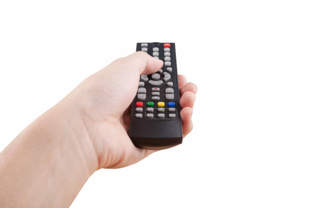 hand with multimedia tv remote control stock photo
