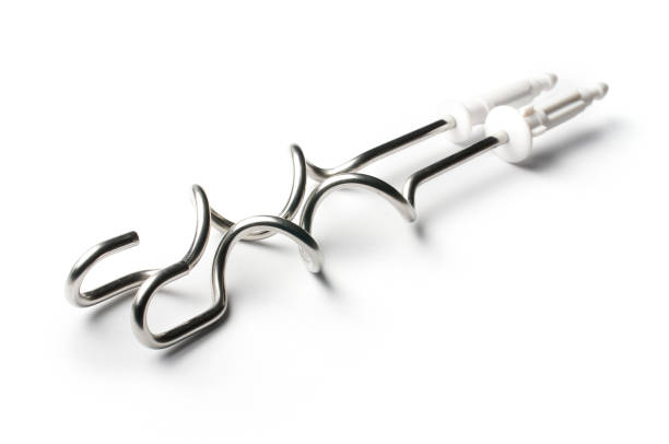 istock Dough hooks for electric hand blender mixer isolated on white 677837416
