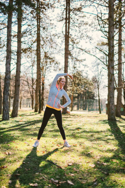 istock Woman exercising outdoors 677841132