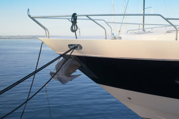 the front of the cruise ship with the anchor raised - yacht luxury front view ships bow imagens e fotografias de stock