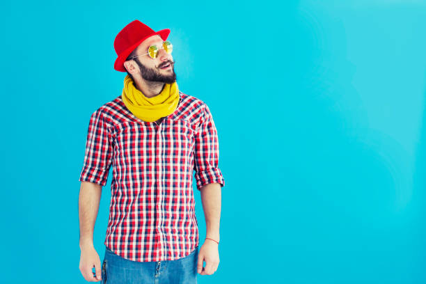 Colorful portrait of a young beard man wearing sunglasses