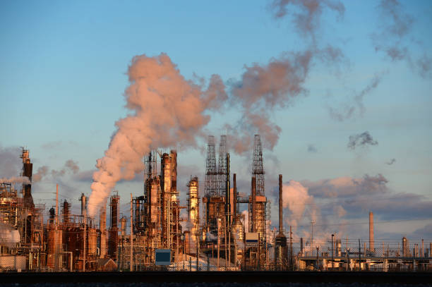 istock Oil Refinery with Smokestacks 677858996