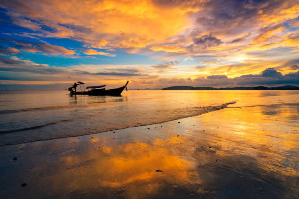 istock silhueate of people with sunset background. 677874046