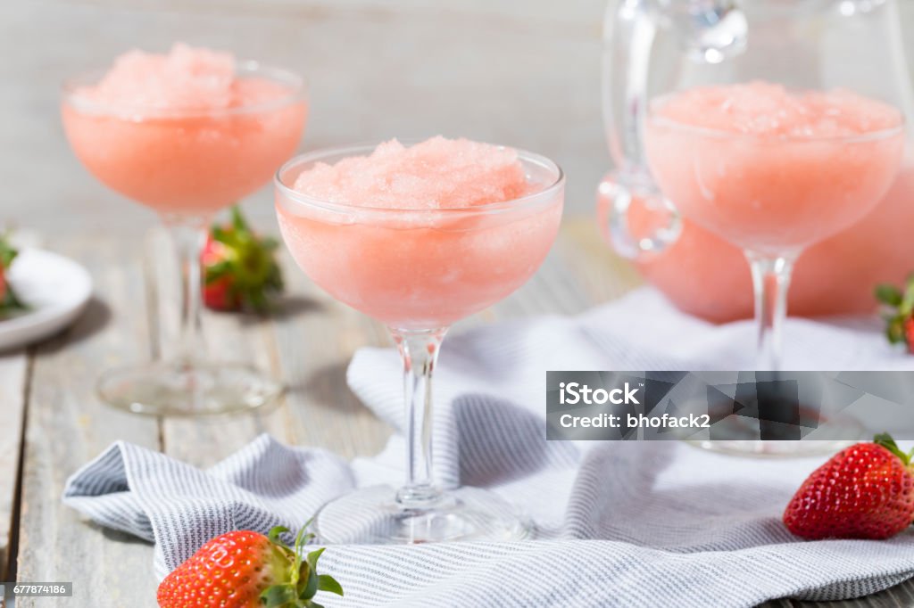 Cold Refreshing Frozen Rosé Wine Cocktail Cold Refreshing Frozen Frosé Rosé Wine Cocktail in the Summer Frozen Stock Photo