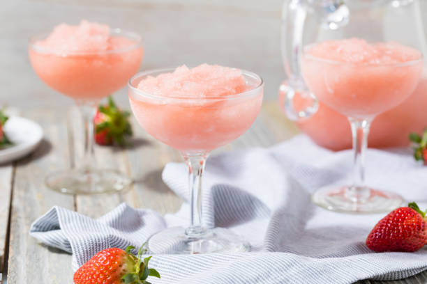 Cold Refreshing Frozen Rosé Wine Cocktail Cold Refreshing Frozen Frosé Rosé Wine Cocktail in the Summer frozen rose stock pictures, royalty-free photos & images