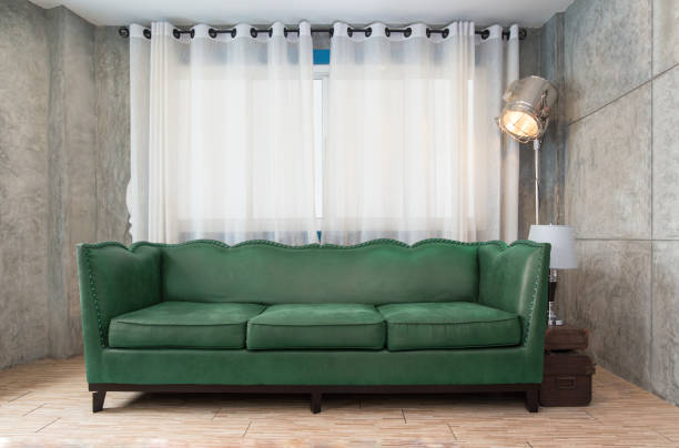 istock Fabric green sofa in living room 677874382