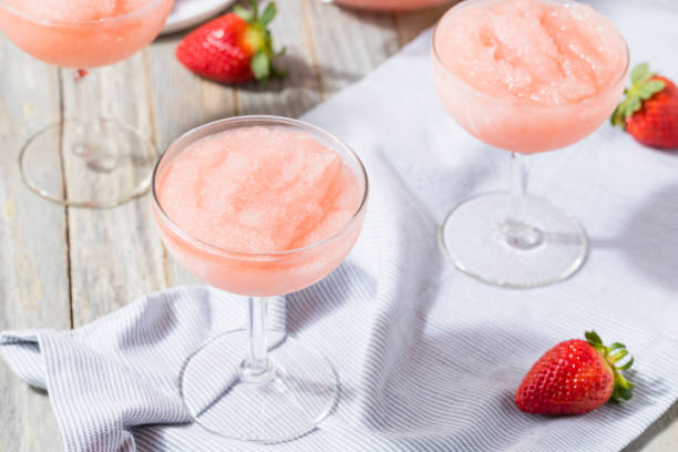 Cold Refreshing Frozen Rosé Wine Cocktail Cold Refreshing Frozen Frosé Rosé Wine Cocktail in the Summer frozen rose stock pictures, royalty-free photos & images