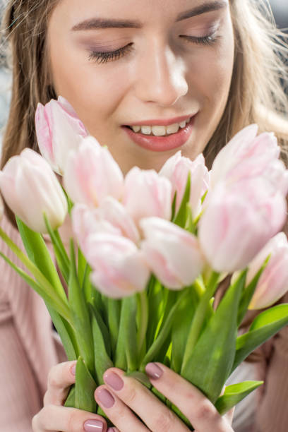 istock Woman with fresh flowers 677906682