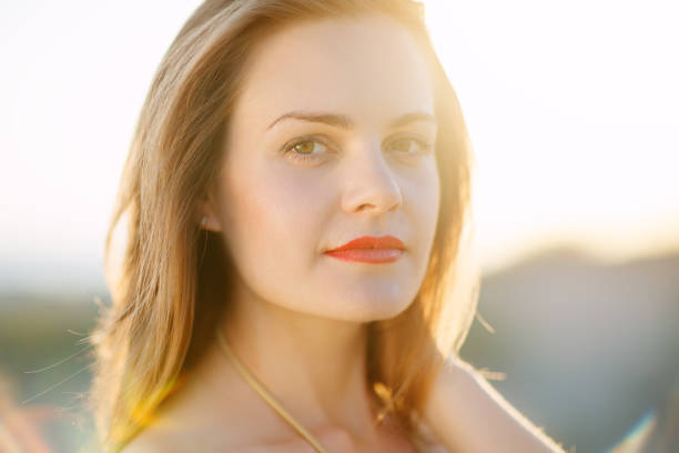 istock Beautiful woman on the beach 677918992