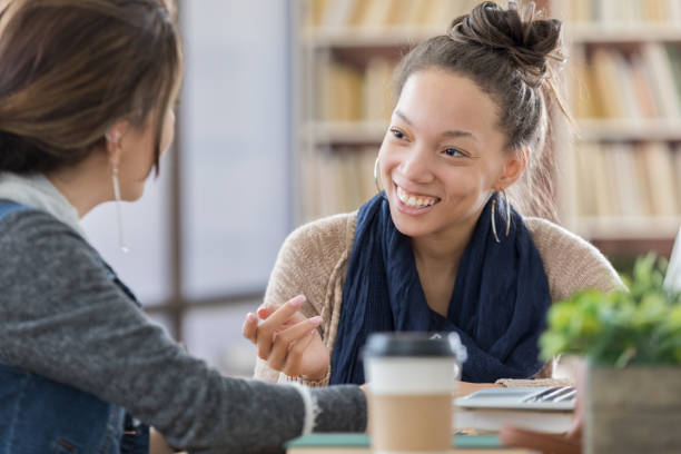 istock Friends talk with one another at school 677930070