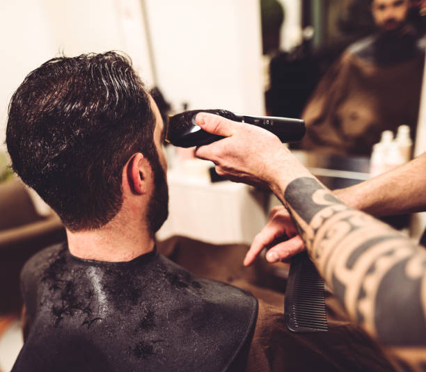 istock customer at the barber shop 677942816