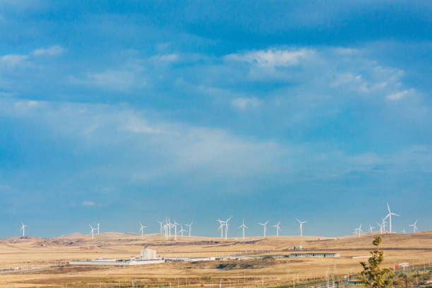 istock Windmill in grassland, prairie in inner mongolia, China 677955514