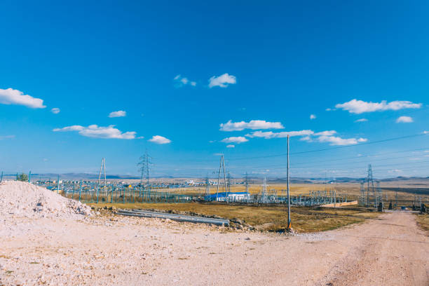 istock electric power transmission pylon on inner mongolia grassland against blue sky  ,China 677959008