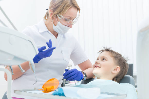 istock The boy heals teeth at the dentist 677977222