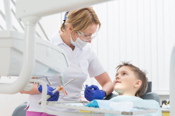 istock The boy heals teeth at the dentist 677977296