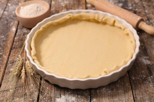 istock raw dough for quiche or tart 677986210