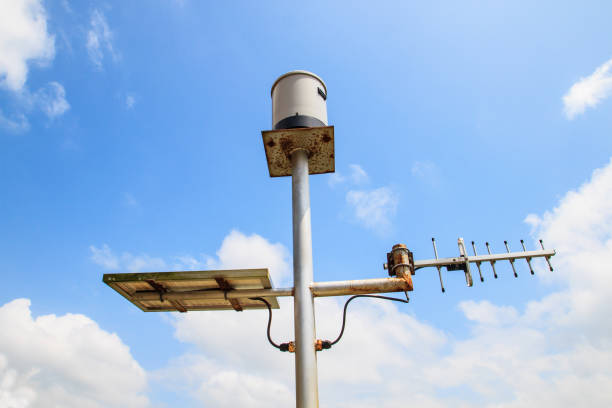 istock Rain gauge and solar panel from dam on cloud and blue sky space. 677999894