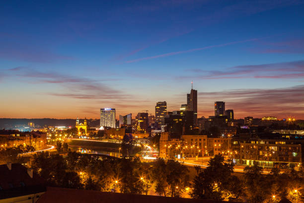 istock VILNIUS, LITHUANIA - 20 AUG 2015. View on the night city and river 678023786