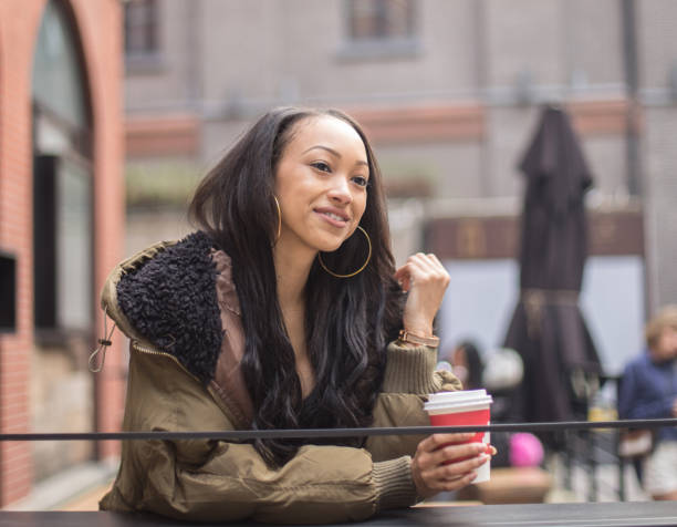istock Girl relaxing in cafe outdoors 678024272