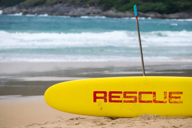 istock Yellow surf rescue board by the sea beach. 678025412