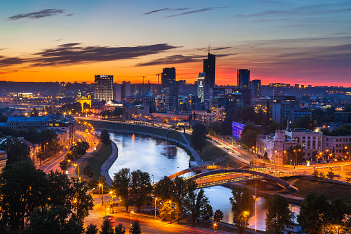 VILNIUS, LITHUANIA - 21 AUG 2015. View on the night business city of Vilnius and river