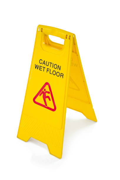 istock Close up of wet floor sigh board 678075814