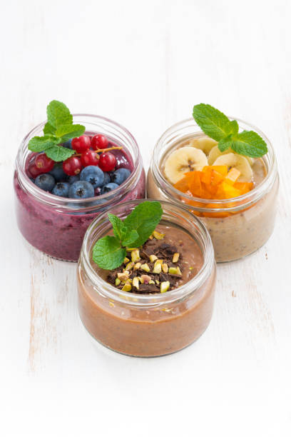 istock desserts with fresh berries, fruit and chocolate on white table 678077156