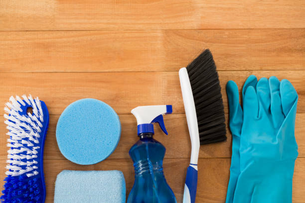 istock Overhead view of different cleaning equipment on table 678077354