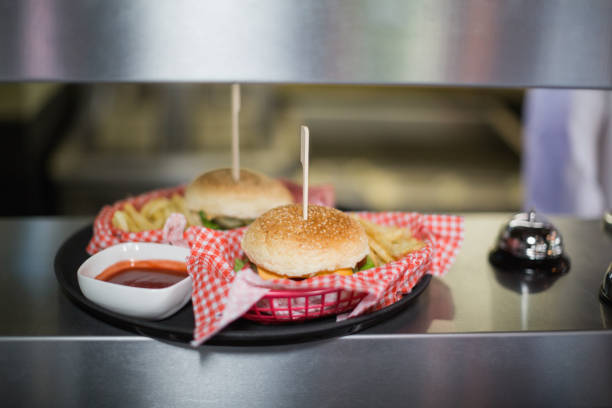 Close up of hamburgers served in plate on table