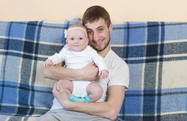 istock Young father with a baby. 678079234