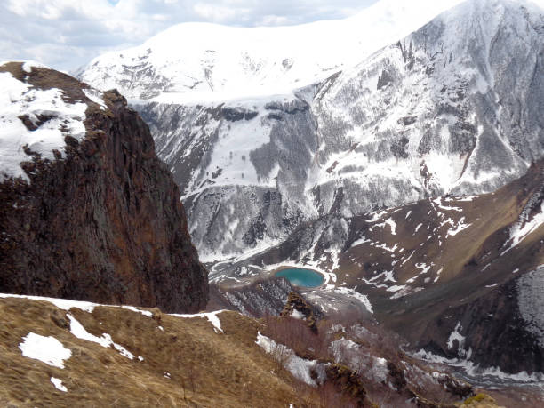 istock Round lake in the mountains 678080668