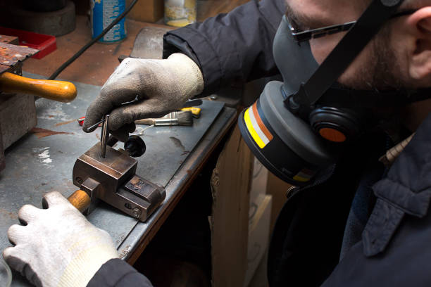 istock Twisting form. Preparation for casting. An employee at the plant craft while working. 678081060